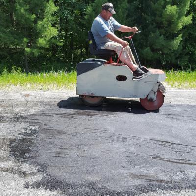 Hot Asphalt Patching project - sealing new asphalt